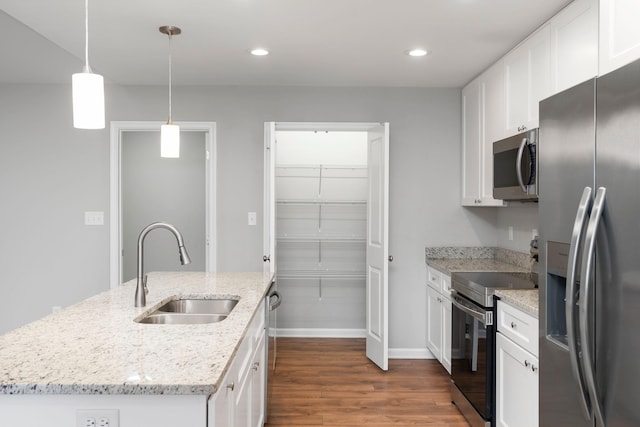 121 Lake View Cir, Waynesboro, VA 22980 - kitchen featuring a sink, white cabinets, dark wood finished floors, baseboards, and appliances with stainless steel finishes