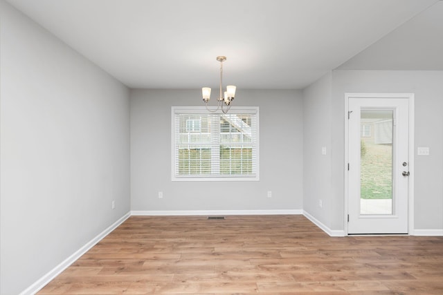 121 Lake View Cir, Waynesboro, VA 22980 - unfurnished dining area featuring baseboards, light wood finished floors, an inviting chandelier, and visible vents