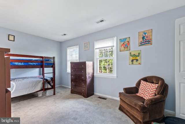  - bedroom with baseboards and carpet floors