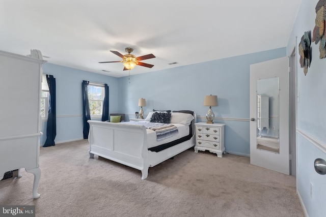  - bedroom featuring carpet floors and ceiling fan