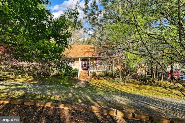 135 Bluewater Blvd S, Mineral, VA 23117 - obstructed view of property featuring a front yard and a porch