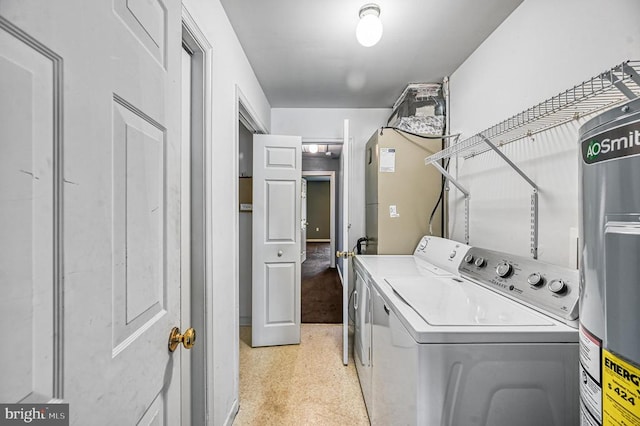 135 Bluewater Blvd S, Mineral, VA 23117 - laundry room with washing machine and dryer and water heater