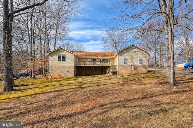 135 Bluewater Blvd S, Mineral, VA 23117 - rear view of house with a deck and a yard