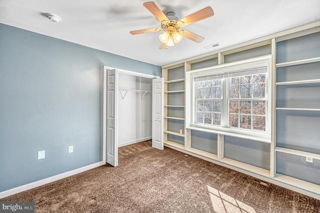 135 Bluewater Blvd S, Mineral, VA 23117 - unfurnished bedroom featuring carpet, baseboards, a closet, and a ceiling fan