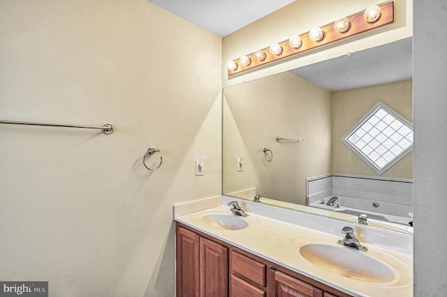 135 Bluewater Blvd S, Mineral, VA 23117 - bathroom featuring double vanity and a garden tub