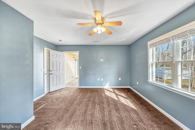 135 Bluewater Blvd S, Mineral, VA 23117 - unfurnished bedroom with baseboards, carpet flooring, and ceiling fan
