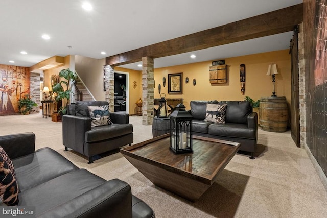  - living area featuring light colored carpet, decorative columns, recessed lighting, and stairway