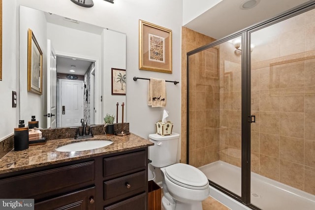  - full bath featuring vanity and a stall shower