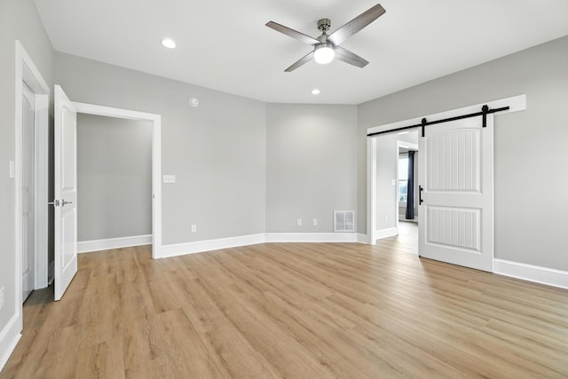 43 Mcilwee Ln, Staunton, VA 24401 - unfurnished room with a ceiling fan, a barn door, light wood finished floors, and recessed lighting