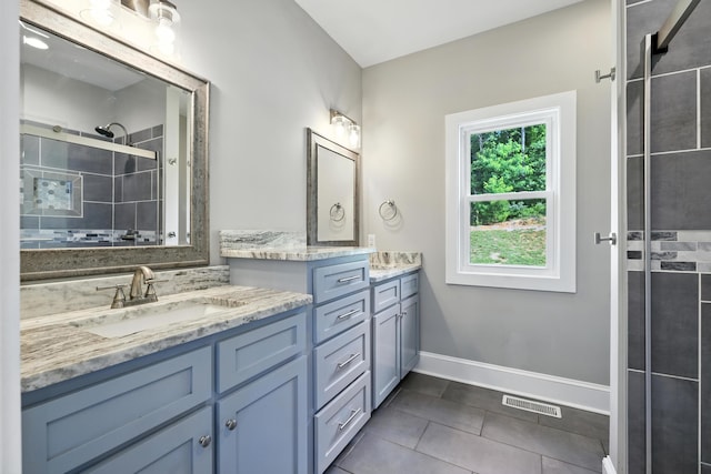 43 Mcilwee Ln, Staunton, VA 24401 - bathroom featuring vanity, tile patterned floors, and tiled shower