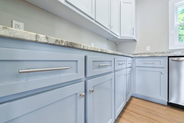 43 Mcilwee Ln, Staunton, VA 24401 - kitchen featuring light wood-style flooring, stainless steel dishwasher, and light stone counters
