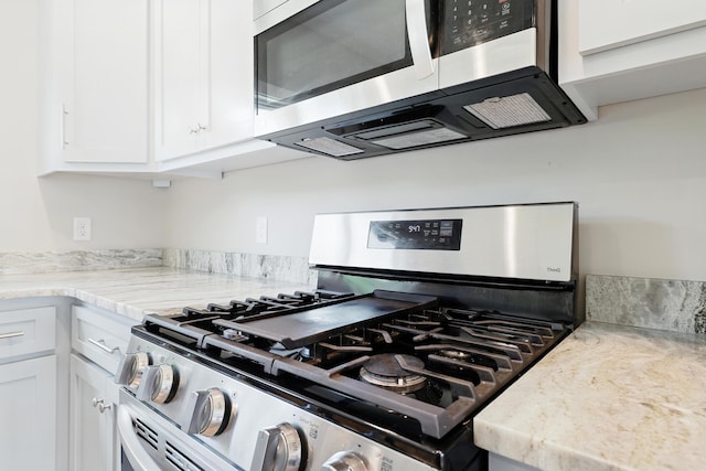 43 Mcilwee Ln, Staunton, VA 24401 - kitchen with appliances with stainless steel finishes and white cabinets