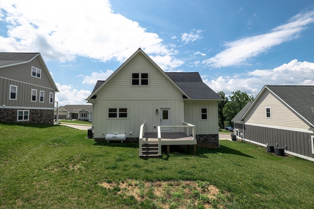 43 Mcilwee Ln, Staunton, VA 24401 - rear view of house featuring board and batten siding, a lawn, and a wooden deck