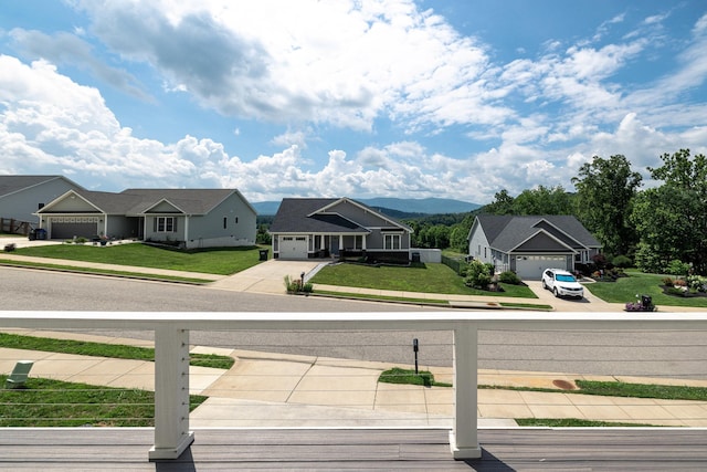 43 Mcilwee Ln, Staunton, VA 24401 - deck with concrete driveway, a lawn, and an attached garage