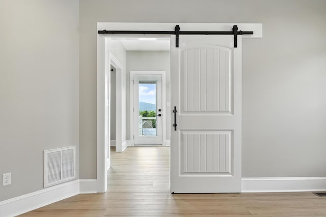 43 Mcilwee Ln, Staunton, VA 24401 - corridor with a barn door and wood finished floors