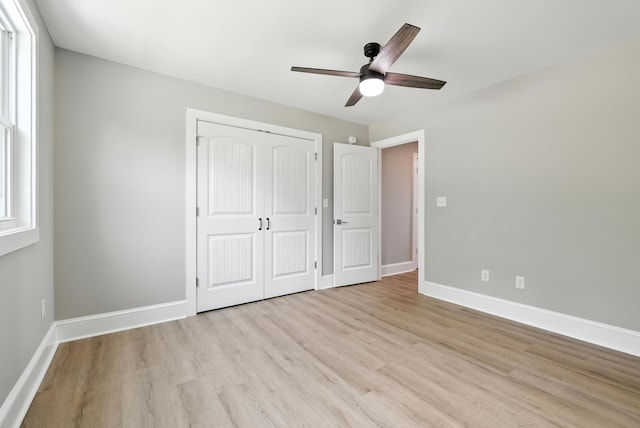 43 Mcilwee Ln, Staunton, VA 24401 - unfurnished bedroom featuring light wood-style floors, a closet, and a ceiling fan