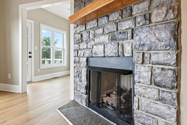 43 Mcilwee Ln, Staunton, VA 24401 - detailed view of a stone fireplace and wood finished floors