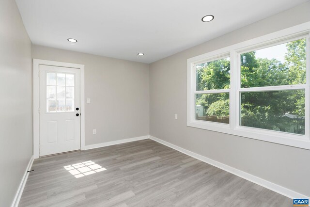 1805 Shenandoah Ave, Waynesboro, VA 22980 - empty room featuring light wood-type flooring and recessed lighting