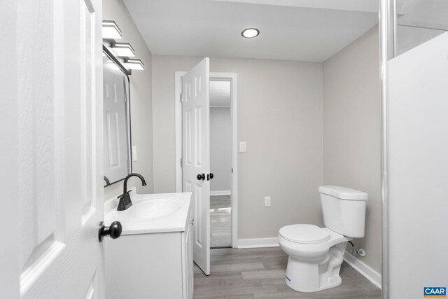 1805 Shenandoah Ave, Waynesboro, VA 22980 - bathroom featuring vanity, wood finished floors, and recessed lighting