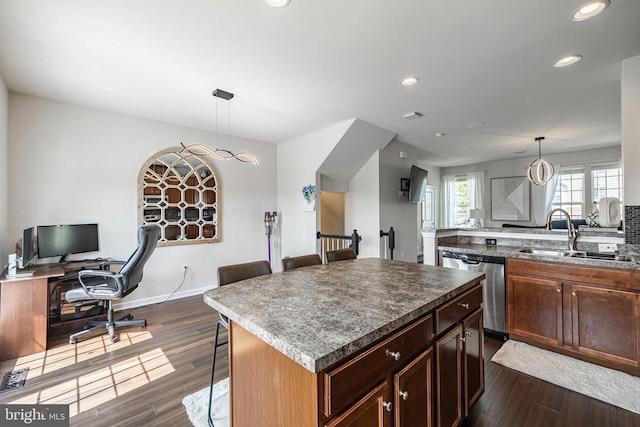 2015 Elm Tree Ct, Charlottesville, VA 22911 - kitchen featuring stainless steel dishwasher, a breakfast bar area, recessed lighting, dark wood-type flooring, and a kitchen island