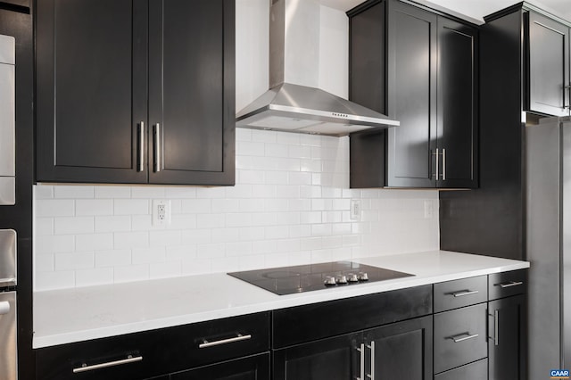 4454 Alston St, Crozet, VA 22932 - kitchen featuring wall chimney range hood, black electric cooktop, tasteful backsplash, light countertops, and dark cabinets
