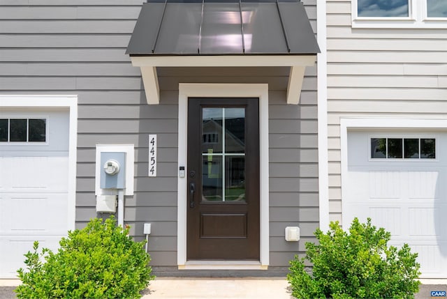 4454 Alston St, Crozet, VA 22932 - doorway to property with a garage
