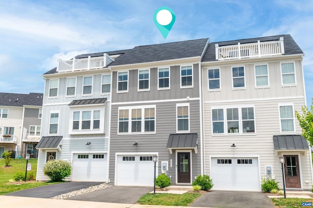 4454 Alston St, Crozet, VA 22932 - view of property featuring driveway, a balcony, and board and batten siding