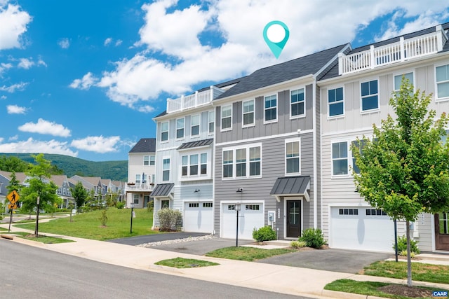 4454 Alston St, Crozet, VA 22932 - multi unit property with board and batten siding, driveway, an attached garage, a residential view, and a standing seam roof
