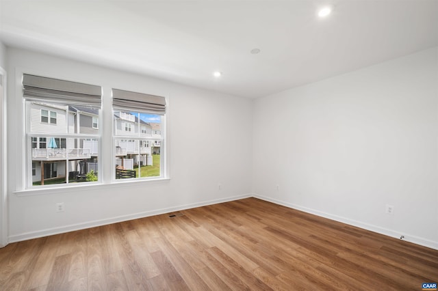 4454 Alston St, Crozet, VA 22932 - unfurnished room featuring wood finished floors and recessed lighting