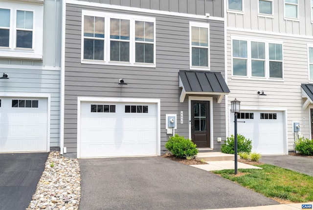 4454 Alston St, Crozet, VA 22932 - multi unit property featuring a garage, a standing seam roof, a metal roof, driveway, and board and batten siding