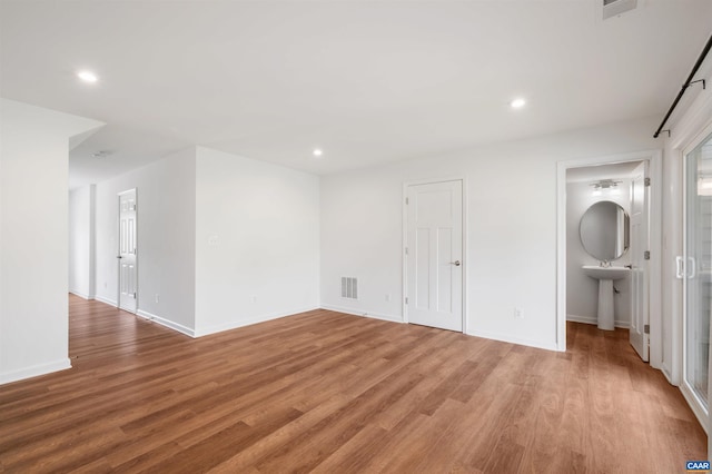 4454 Alston St, Crozet, VA 22932 - basement featuring light wood-type flooring and recessed lighting