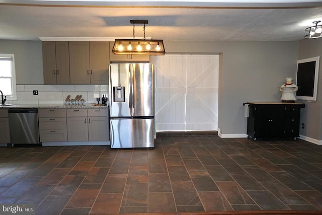7435 Courthouse Rd, Spotsylvania, VA 22551 - kitchen featuring stainless steel appliances, baseboards, and pendant lighting