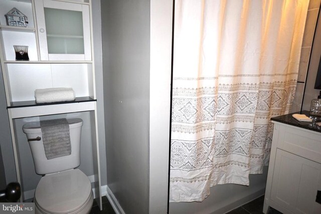 7435 Courthouse Rd, Spotsylvania, VA 22551 - full bath with toilet, a shower with curtain, and baseboards