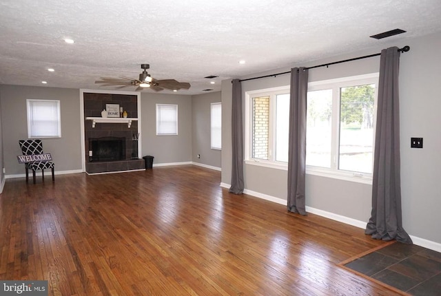 7435 Courthouse Rd, Spotsylvania, VA 22551 - unfurnished living room with ceiling fan, a textured ceiling, wood finished floors, baseboards, and recessed lighting