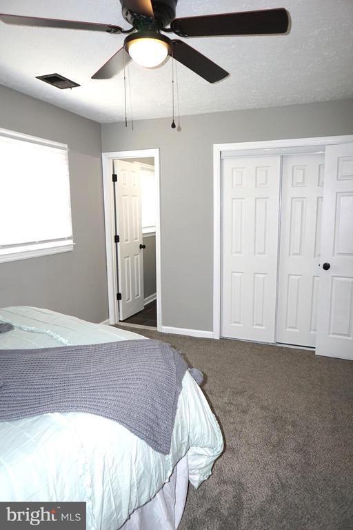 7435 Courthouse Rd, Spotsylvania, VA 22551 - bedroom featuring carpet, a closet, and ceiling fan