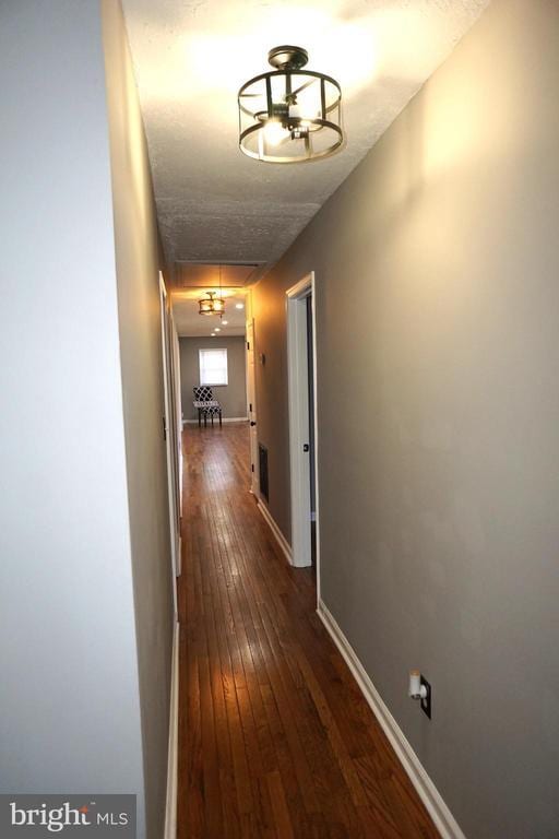 7435 Courthouse Rd, Spotsylvania, VA 22551 - hall featuring dark wood finished floors and baseboards