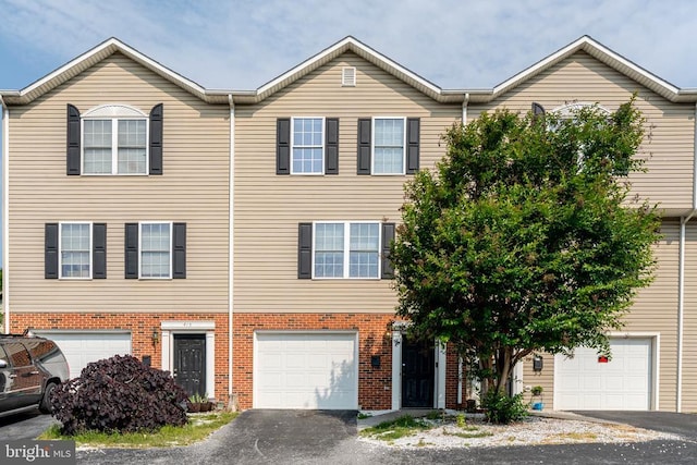 417 Maryland Ave, Shenandoah, VA 22849 - multi unit property featuring driveway, brick siding, and a garage