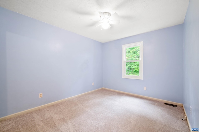 147 Scarborough Pl, Charlottesville, VA 22903 - carpeted spare room with a ceiling fan and baseboards