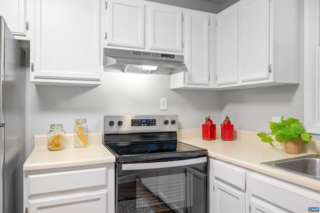 147 Scarborough Pl, Charlottesville, VA 22903 - kitchen featuring stainless steel appliances, under cabinet range hood, white cabinetry, and light countertops