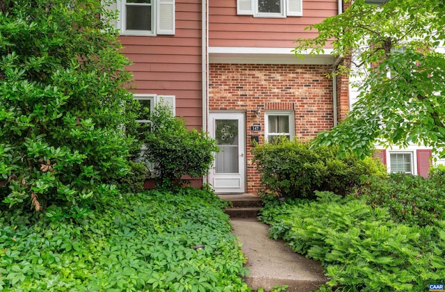 147 Scarborough Pl, Charlottesville, VA 22903 - property entrance featuring brick siding