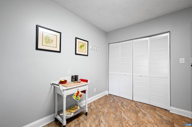 147 Scarborough Pl, Charlottesville, VA 22903 - office with baseboards and a textured ceiling