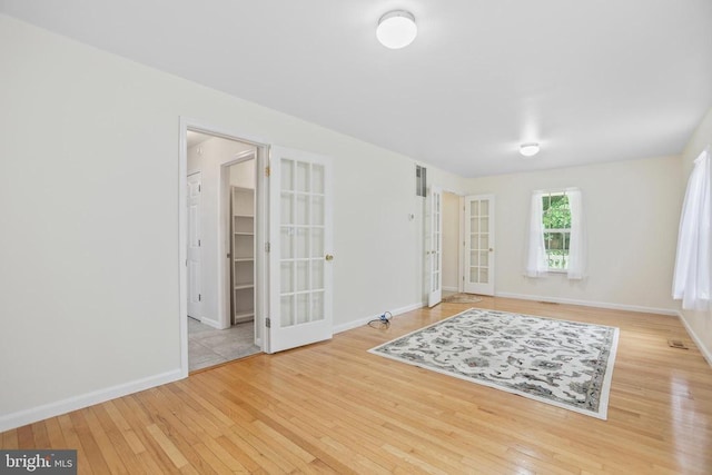 9071 Old Culpeper Rd, Warrenton, VA 20186 - empty room with french doors and wood-type flooring