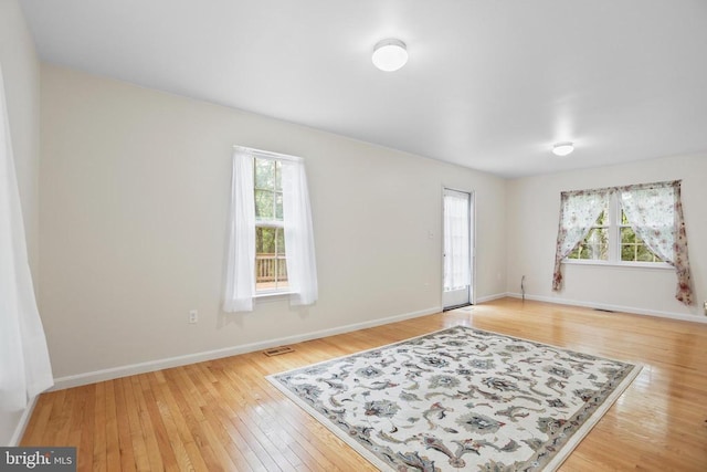 9071 Old Culpeper Rd, Warrenton, VA 20186 - empty room featuring plenty of natural light and light wood finished floors