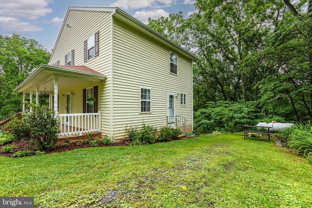 9071 Old Culpeper Rd, Warrenton, VA 20186 - view of side of home with covered porch and a lawn