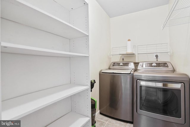 9071 Old Culpeper Rd, Warrenton, VA 20186 - laundry room featuring washing machine and dryer and light tile patterned flooring