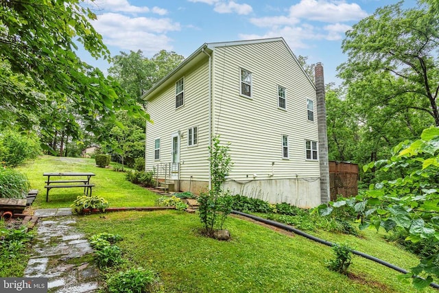 9071 Old Culpeper Rd, Warrenton, VA 20186 - view of property exterior featuring a yard and a chimney