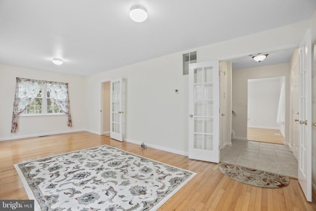 9071 Old Culpeper Rd, Warrenton, VA 20186 - empty room featuring french doors and wood finished floors