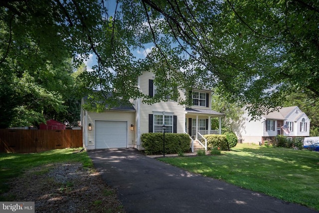 5008 Blake Dr, Fredericksburg, VA 22407 - traditional-style house featuring a garage, driveway, and a porch