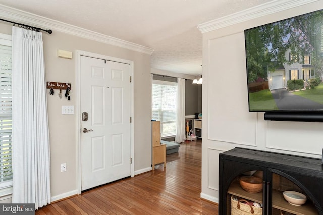 5008 Blake Dr, Fredericksburg, VA 22407 - foyer with hardwood / wood-style floors, crown molding, and a chandelier