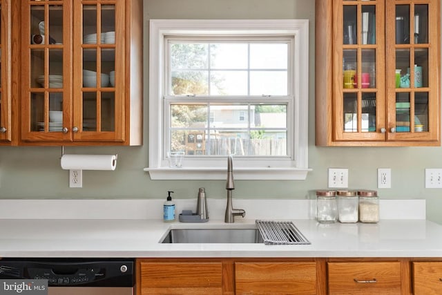 5008 Blake Dr, Fredericksburg, VA 22407 - kitchen featuring black dishwasher, glass insert cabinets, and brown cabinets